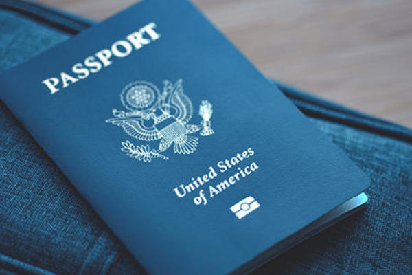 US passport on a jean bag